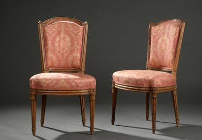 Pair of molded and carved wooden chairs,...
