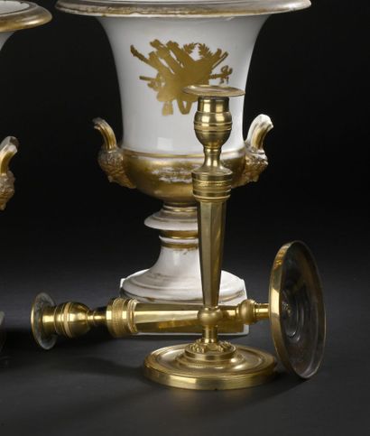 Pair of gilt and chased bronze candlesticks,...