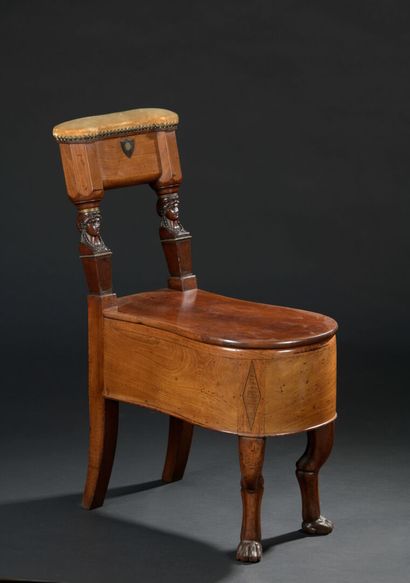 An Empire period mahogany and mahogany veneer...