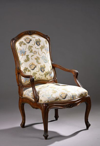 High-back frame armchair in molded and carved...