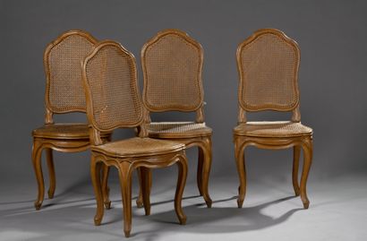 Suite of four finely molded wooden chairs,...