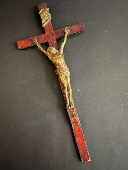 Cross-shaped crucifix in chased and patinated...