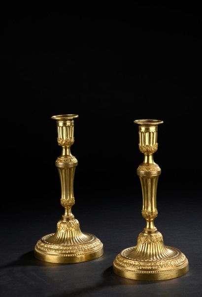 Pair of chased gilt bronze candlesticks from...