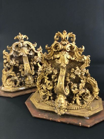 Two gilded and carved wood sconce brackets...