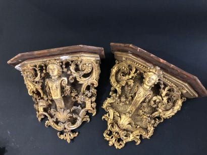 Two gilded and carved wood sconce brackets...