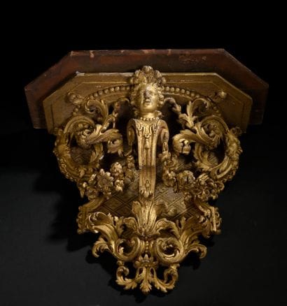 Two gilded and carved wood sconce brackets...