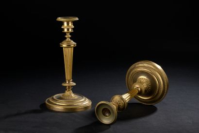 Pair of chased and gilt bronze candlesticks,...