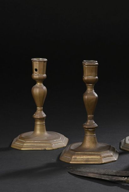 Two molded bronze candlesticks (pair), early...