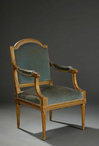 Carved and gilded molded wood armchair stamped...