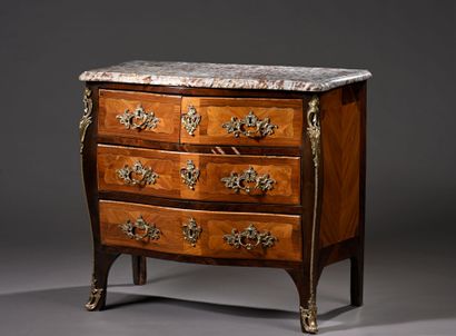 Amaranth and rosewood veneered chest of drawers...