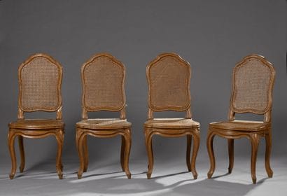 Suite of four finely molded wooden chairs,...
