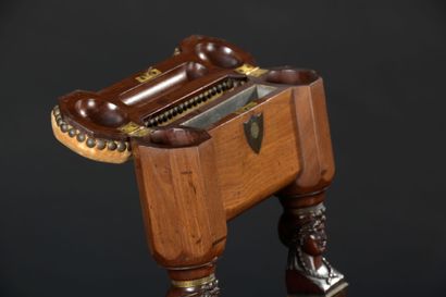 An Empire period mahogany and mahogany veneer...