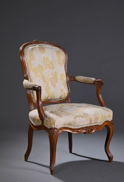Louis XV period armchair in molded and carved...