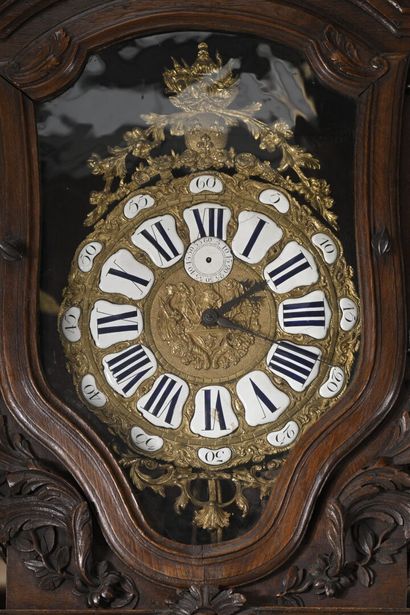 Molded and carved oak floor clock, 18th century
Decorated...