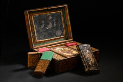 Straw marquetry box decorated with a city
Two...