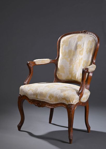 Louis XV period armchair in molded and carved...
