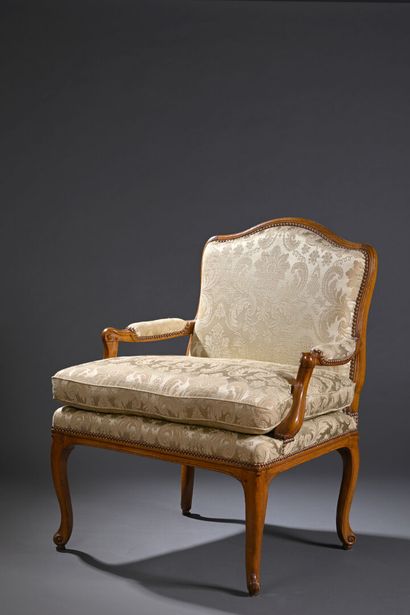 Large, simply molded wooden armchair by Nicolas-Quinibert...