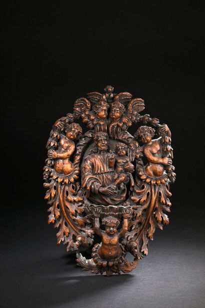 Molded and carved walnut stoup 17th century
Decorated...