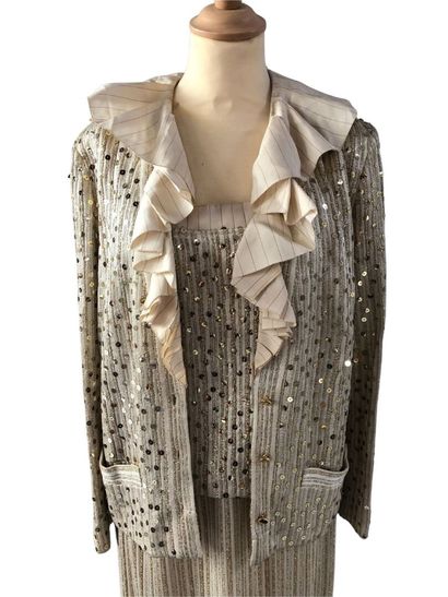 CHRISTIAN DIOR BOUTIQUE:
Ruffled cardigan...