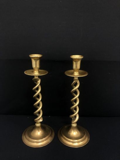 PAIR OF brass CANDLESTICKS, the shaft decorated...