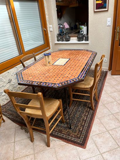 Octagonal garden table with mosaics.
160...