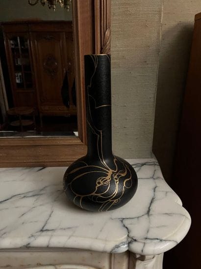 VASE with long neck and rounded black body...