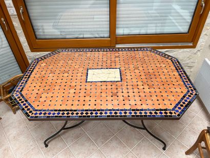 Octagonal garden table with mosaics.
160...
