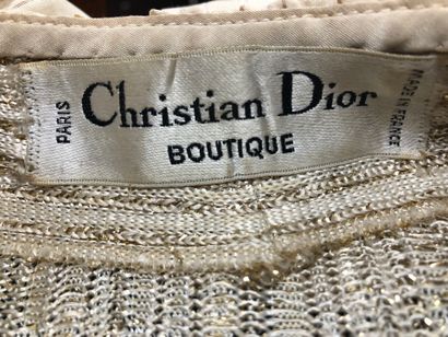 CHRISTIAN DIOR BOUTIQUE:
Ruffled cardigan...