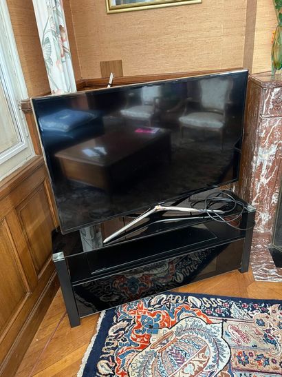 Flat screen TELEVISION and its black lacquered...