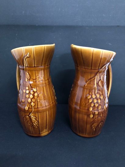 LOT of four barbotine pitchers including:
-...