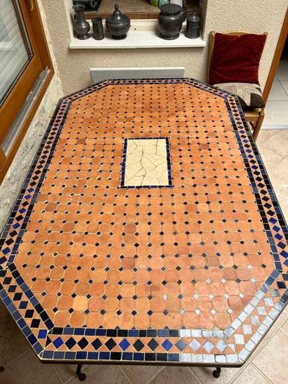 Octagonal garden table with mosaics.
160...