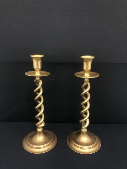 PAIR OF brass CANDLESTICKS, the shaft decorated...
