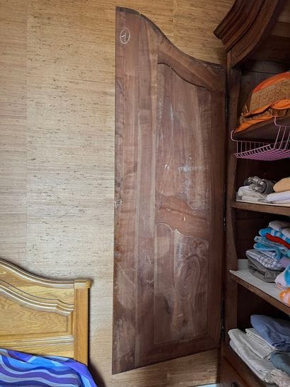 LARGE walnut cupboard opening with two doors...
