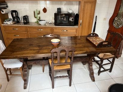 Rectangular oak table with braces and 4 mismatched...