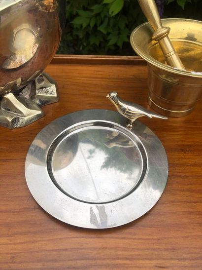 LOT comprising a metal dish decorated with...