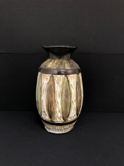 LOSSON :
Enameled stoneware vase signed on...