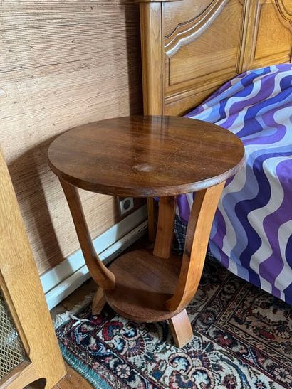 Round walnut bedside table with three legs...