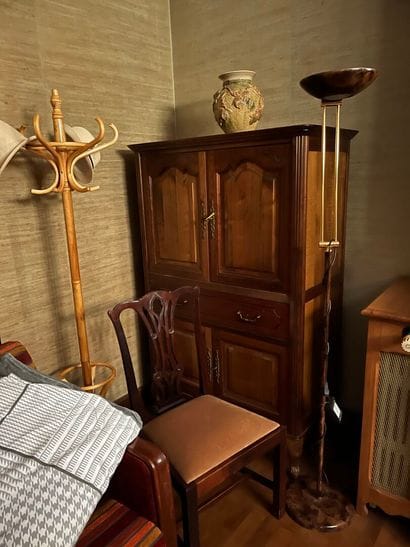 ARMOIRE opening with four leaves and a drawer....