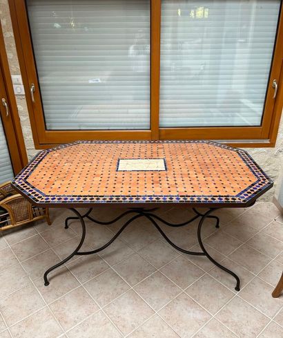Octagonal garden table with mosaics.
160...