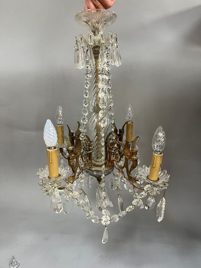Chandelier with 4 light arms and winged sphinxes.
Modern.
H:...