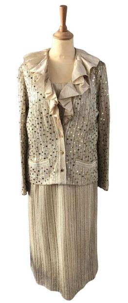 CHRISTIAN DIOR BOUTIQUE:
Ruffled cardigan...
