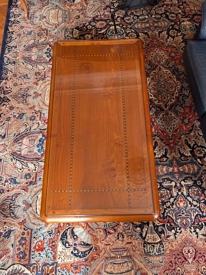 Low mahogany TABLE with glass top, opening...