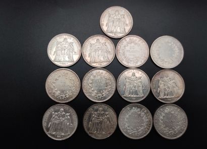 Thirteen Hercules-type silver 10 franc coins
6...