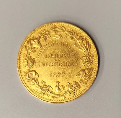 Gold medal from the 1877 Oranaise Exhibition...
