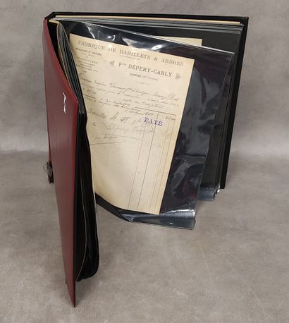 A binder containing approximately 91 invoices,...