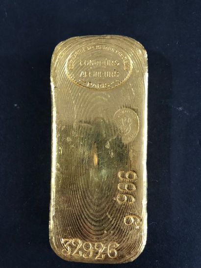 A gold ingot weighing 1004.5 g with a fineness...