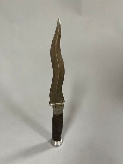 Metal knife, wavy blade, turned wooden spindle....