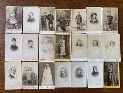 LOT of 29 photographic portraits pasted in...