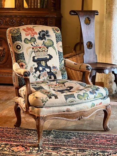 Low armchair with flat back, Louis XV period...