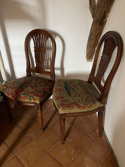 Suite of four Louis XVI-style natural wood...